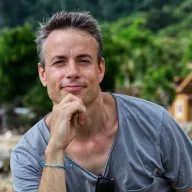Samuel Mellert on Koh Chang, chin resting on his hand